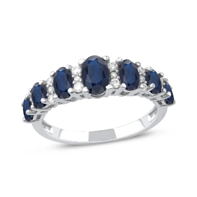 women’s timeless engagement rings -Blue Sapphire Gemstone 1/6ct Diamond Band in 10k White Gold by De Couer