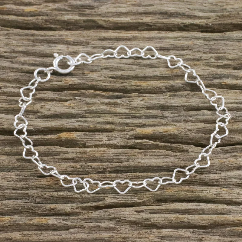 boho-style bracelets for women -Lots of Love Heart Motif Sterling Silver Link Bracelet from Thailand