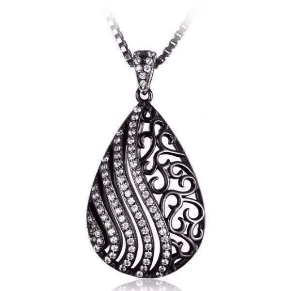 women’s unique necklaces -Ebony Swirl Black Gold Filigree and CZ Pendant Necklace